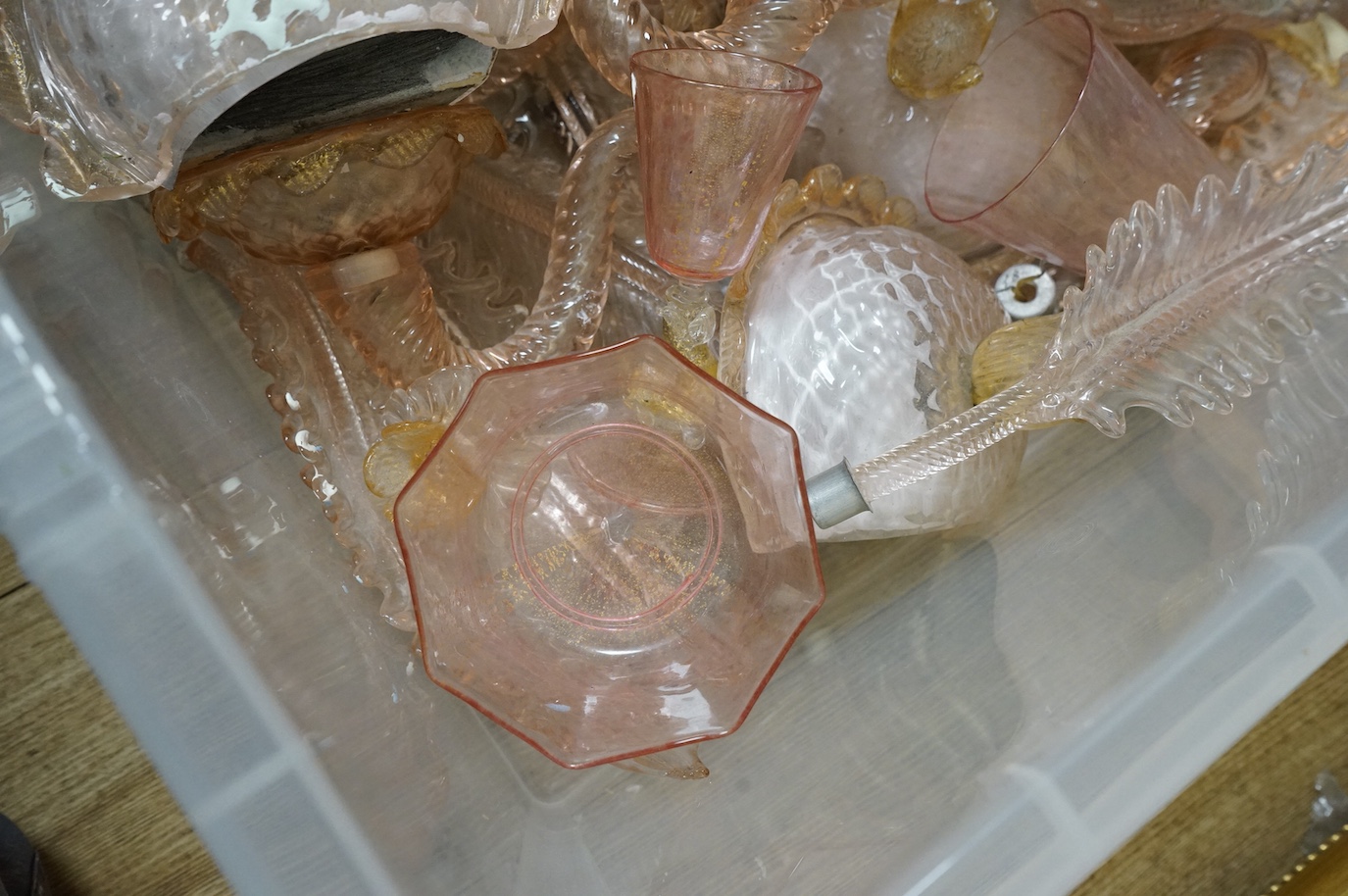 A collection of Murano pink glass wall lights and glasses